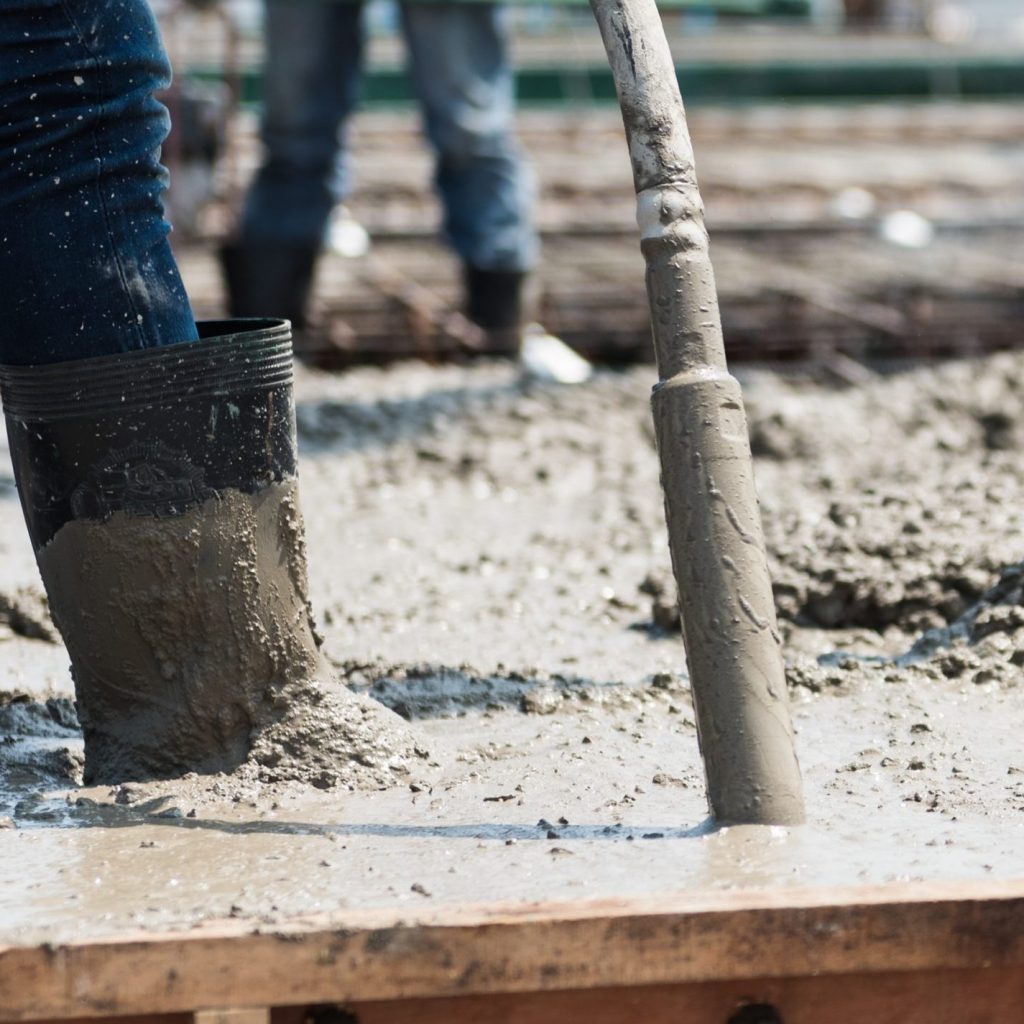 Concrete,Casting,Work.,Using,Concrete,Vibrator,For,Compacting,Concrete ...